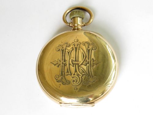 fig 1. An antique Minerva half hunter pocket watch.