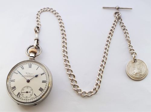 fig 2. Antique silver Waltham pocket watch and chain.