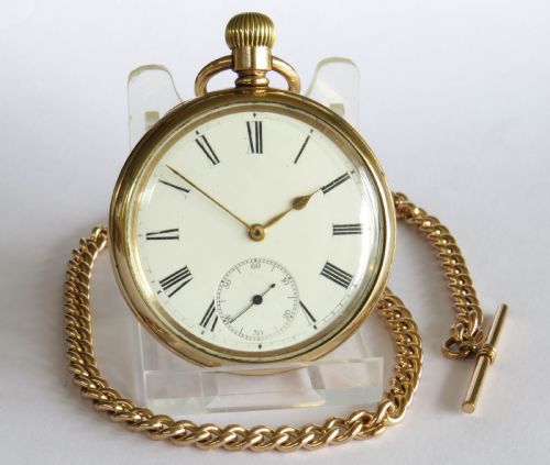 fig 1. Antique Omega pocket watch and chain