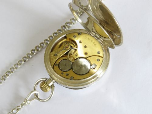 fig 1. Antique 1909 silver Omega pocket watch and chain