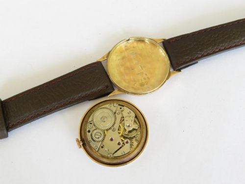 fig 2. Mid-size 9ct gold Trojan wrist watch, 1958