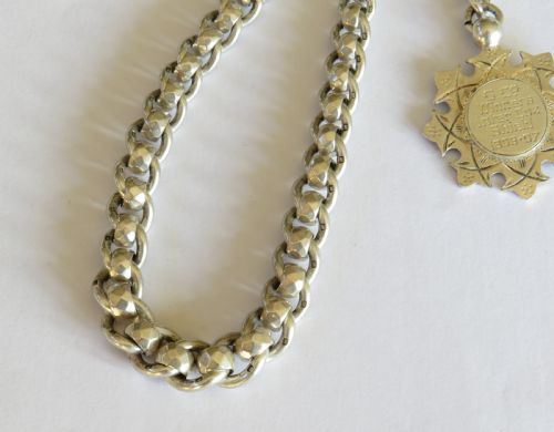 fig 1. Unusual 1920s silver watch chain and fob