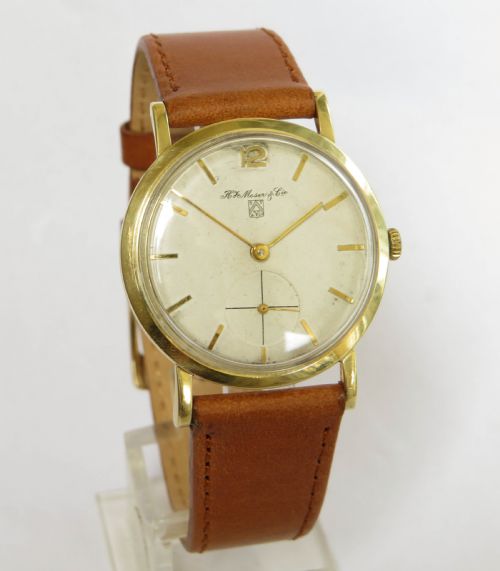 fig 1. Gents 14ct gold Henry Moser wrist watch, 1960