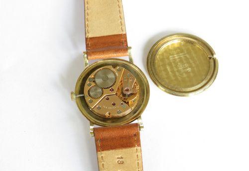 fig 2. Gents 14ct gold Henry Moser wrist watch, 1960