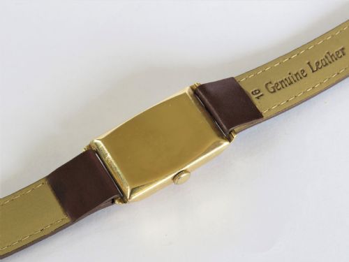 fig 4. Gents 9ct gold Cyma wrist watch for J W Benson