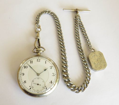 fig 1. Antique Zenith pocket watch and chain