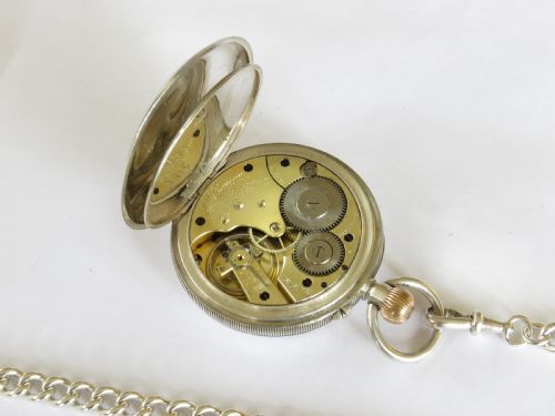 fig 2. Antique silver Longines pocket watch retailed by J W Benson, and chain