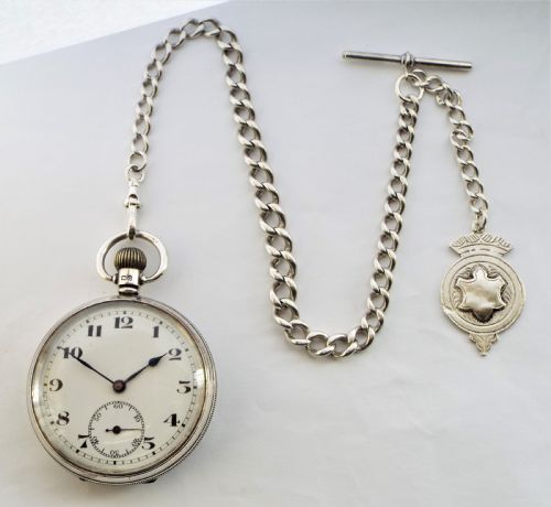 fig 2. 1931 silver pocket watch with chain.
