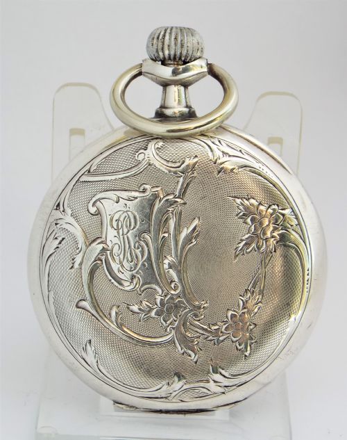 fig 1. Antique silver Omega pocket watch.