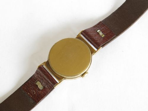 fig 3. J W Benson 9ct gold mid-size wrist watch, 1949