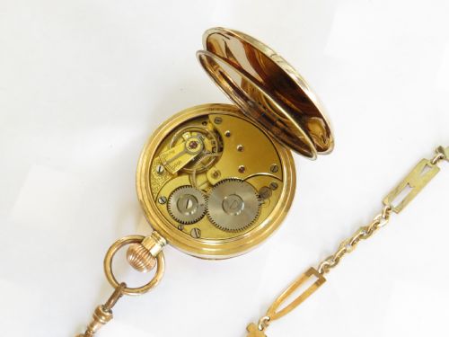 fig 2. Antique Omega pocket watch and chain