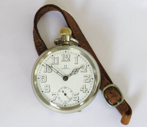 fig 1. WW1 Omega pocket watch and albert