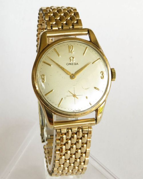 fig 1. Gents 9ct gold Omega wrist watch, 1961