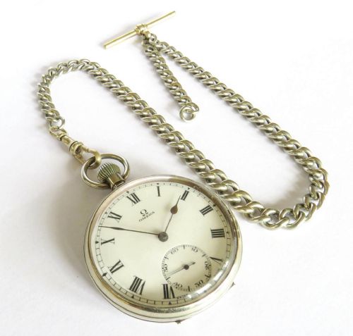 fig 1. Antique Omega pocket watch and chain