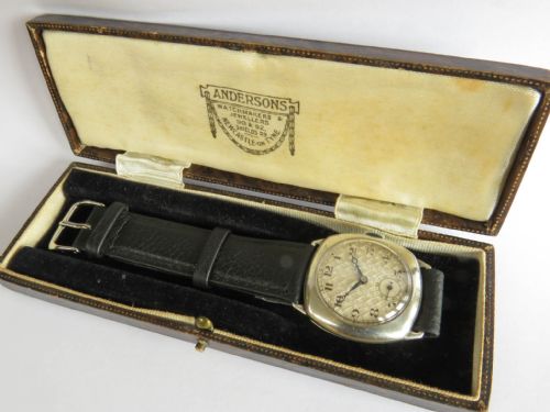 fig 1. Gents silver cushion cased wrist watch, 1930