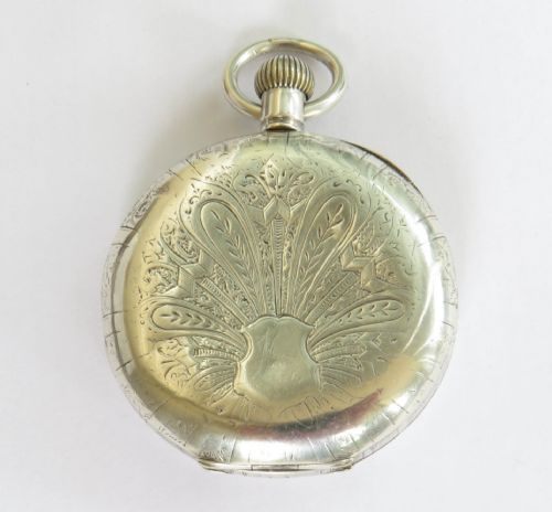 fig 1. Antique silver Omega full hunter pocket watch, ornate case