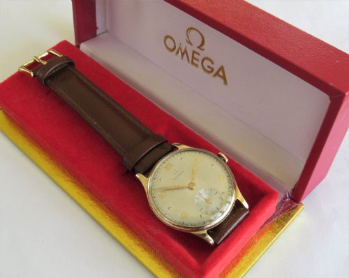 fig 1. Gents 1950s 9ct gold Omega wrist watch