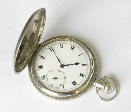 fig 1. Antique 1922 silver Revue full hunter pocket watch