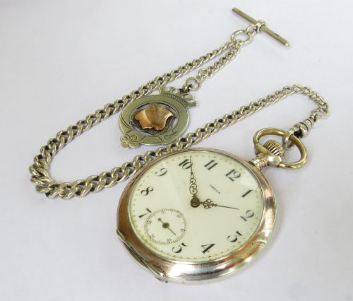 fig 1. Antique silver Omega pocket watch and chain