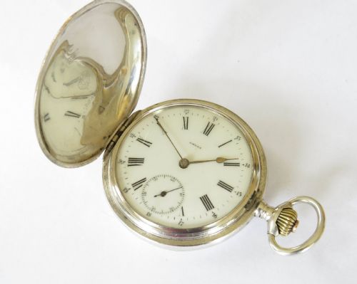 fig 1. Antique silver Omega full hunter pocket watch