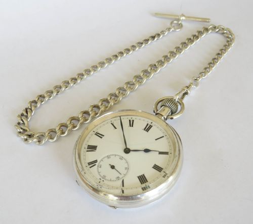 fig 1. Antique silver Longines pocket watch for J W Benson, with chain