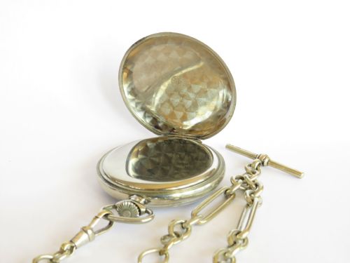 fig 1. Antique Zenith pocket watch and chain