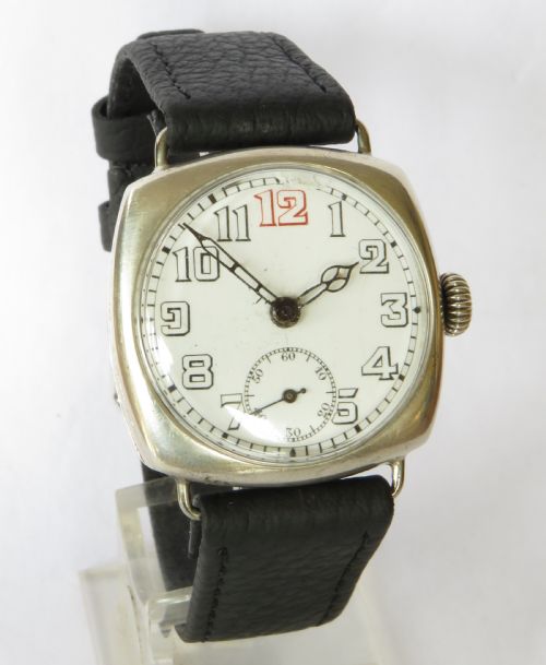 fig 1. Gents antique silver cushion cased watch, 1929