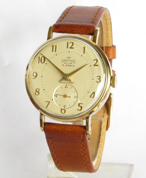 Gents 9ct Gold Smiths De Luxe Wrist Watch, 1962