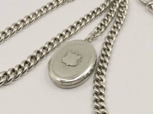 fig 1. Antique silver double watch chain and locket fob