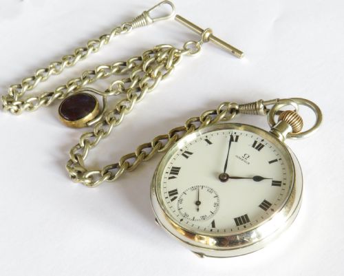 fig 1. Antique Omega pocket watch and chain