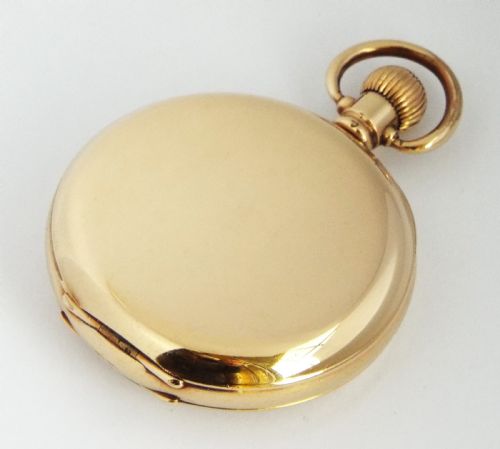 fig 2. A vintage 1920s Swiss half hunter pocket watch.