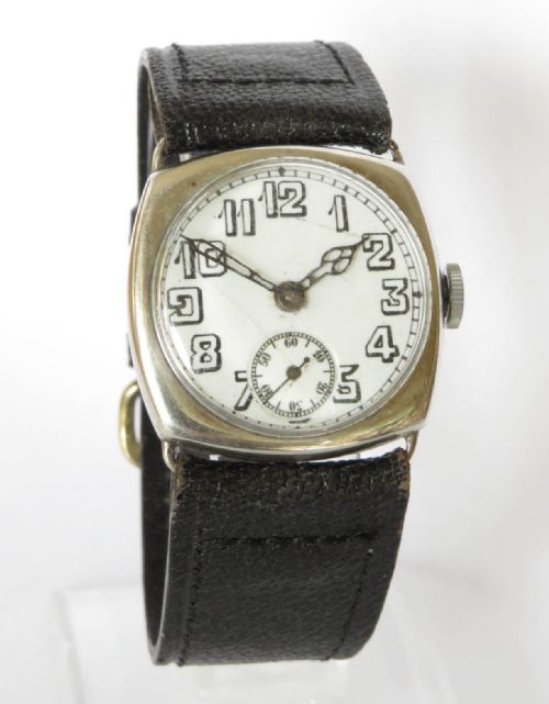 fig 1. 1930s silver cushion cased wrist watch