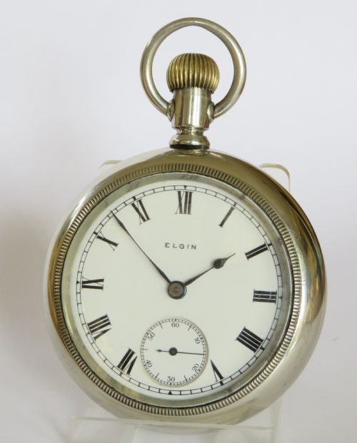 fig 1. Antique Elgin pocket watch and chain