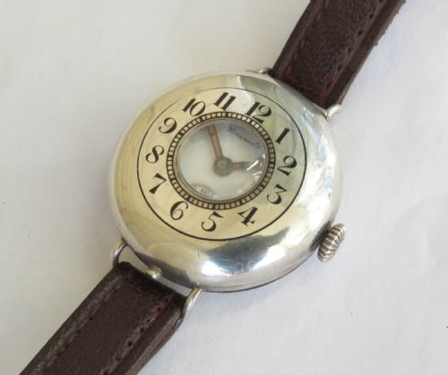 fig 1. Antique silver Marvin half hunter trench watch, Harrods