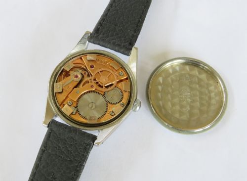 fig 1. Gents Omega wrist watch, Royal Navy, 1947