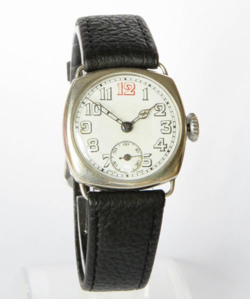 fig 1. Mid-size silver wrist watch, 1928