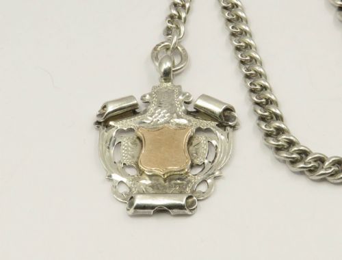 fig 1. Antique silver watch chain and fob, 1916