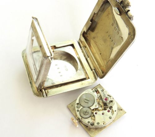 fig 1. Silver purse watch in the form of a handbag, 1933