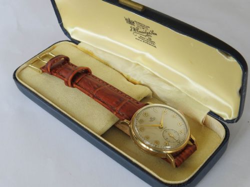 fig 1. Gents 9ct gold Smiths De Luxe wrist watch, Austin Motors, 1954