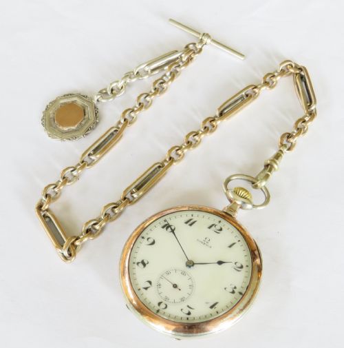 fig 1. Antique silver Omega pocket watch and chain