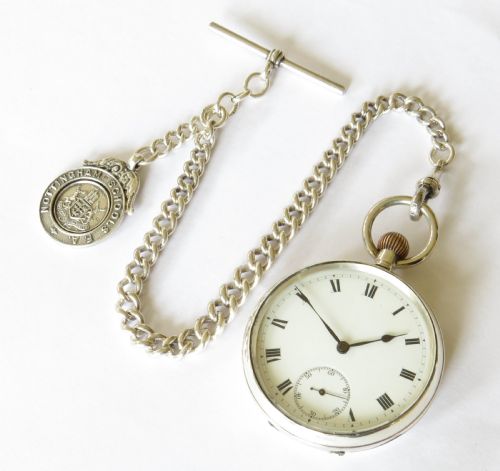 fig 1. Antique silver pocket watch and chain