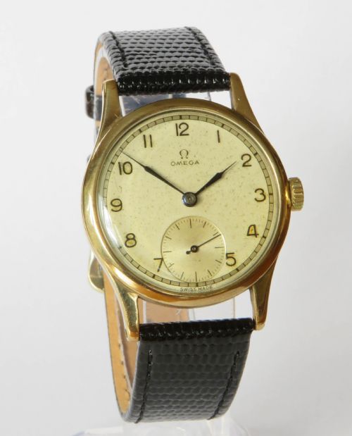 fig 1. Gents 9ct gold Omega wrist watch, 1944