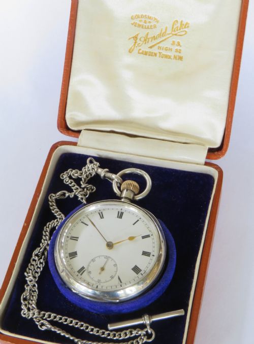 fig 1. Antique silver Omega pocket watch and chain