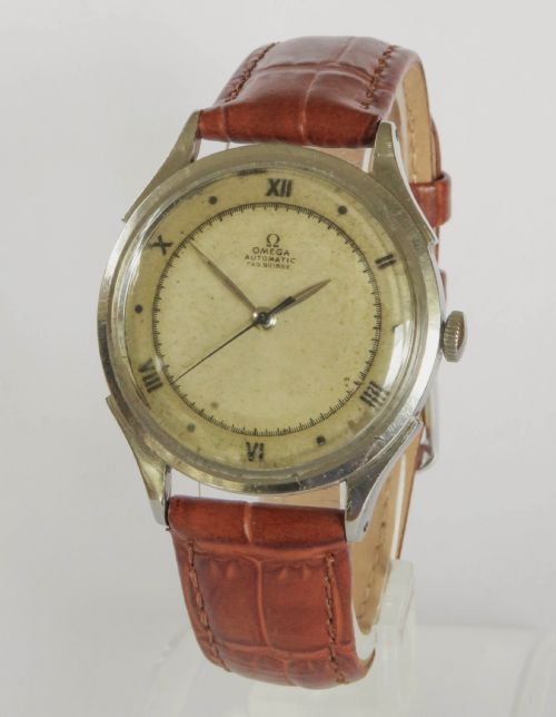 fig 1. Gents Omega Ambassador bumper automatic wrist watch, 1944