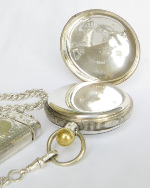 fig 2. Silver Cyma pocket watch, chain and vesta