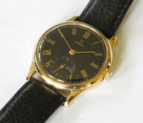 fig 1. Gents 9ct gold Omega 30T2 wrist watch, 1945