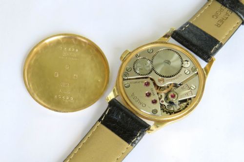 fig 2. Gents 9ct gold Omega 30T2 wrist watch, 1945