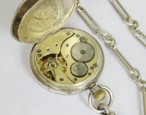 fig 3. Antique silver Omega pocket watch and chain