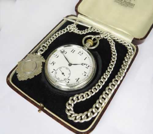 fig 1. Swiss silver pocket watch and chain