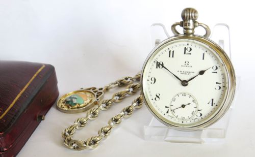 fig 1. Antique silver Omega pocket watch and chain
